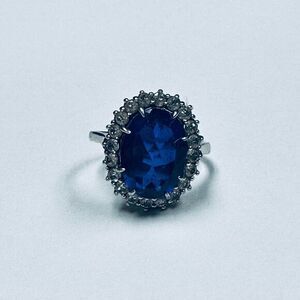 princess Diana sapphire engagement ring with clear stones